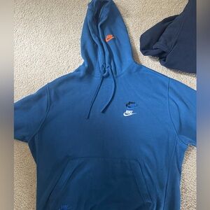 Nike Blue Hoodie with Orange and White Accents